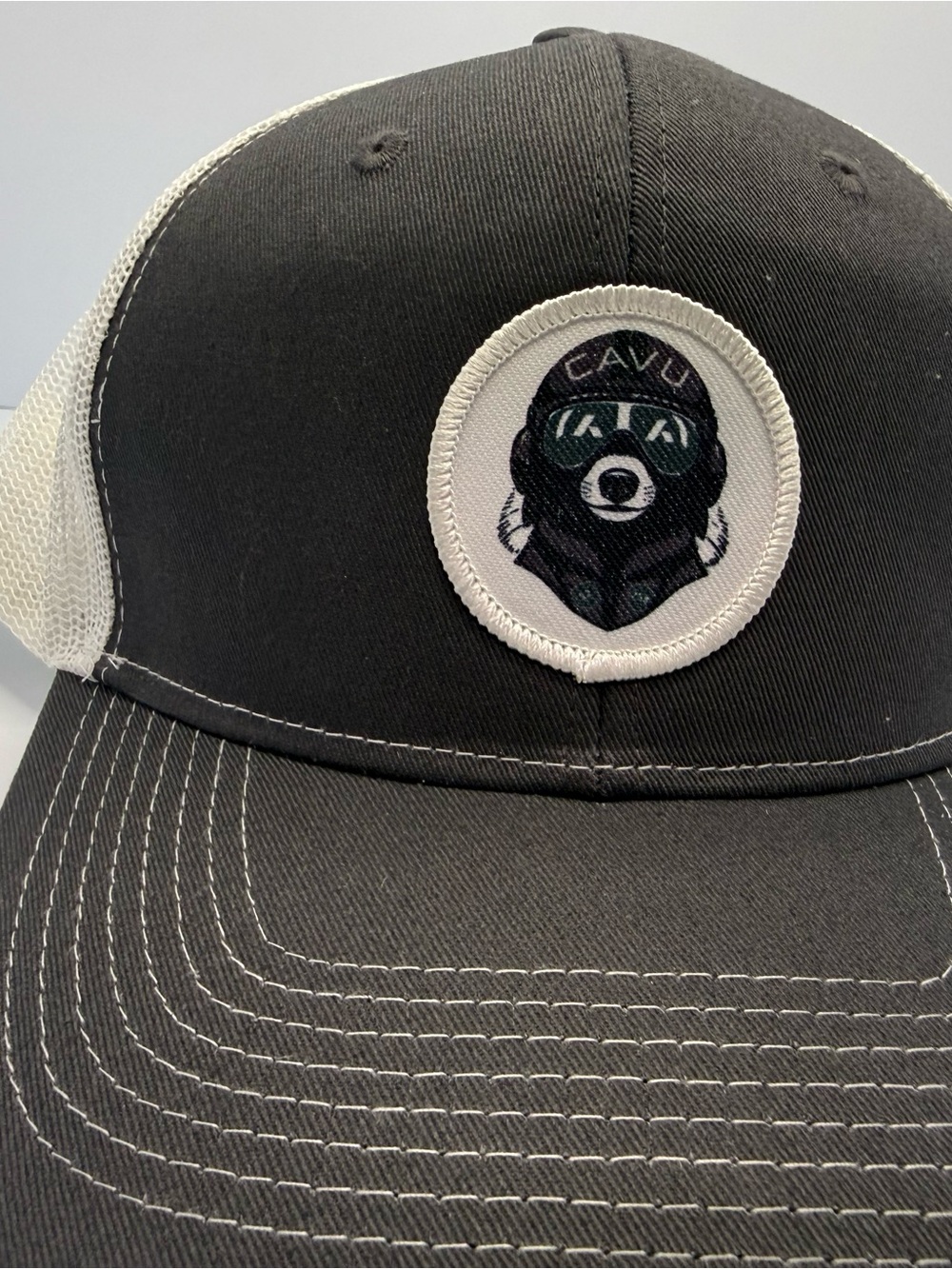 Port Authority blank and white truckerhat mesh back adjustable bear patch